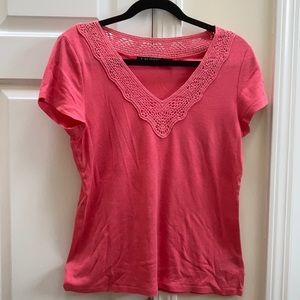 100% Cotton Tee in a pale orange color